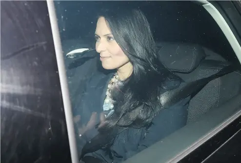  ?? CARL COURT / GETTY IMAGES ?? Priti Patel, former U.K. internatio­nal developmen­t secretary, departs Downing Street after resigning Wednesday. She was summoned back to the U.K. from Uganda as details of her unofficial meetings with Israeli officials emerged.