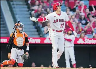  ?? Ashley Landis Associated Press ?? LEARNING TO get a better hold of pitches has helped put Ohtani on pace for 60 home runs. One sign is that his ground ball rate is a career-low 38.9% while his f ly ball rate is a career-best 32%.