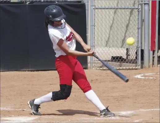  ?? KARINA LOPEZ PHOTO ?? IVC’s Melannie Ibarra connects with a pitch against COD on Wednesday afternoon.