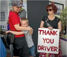  ??  ?? The Labour Day protest saw union members and public transport users turn out with placards and signs.