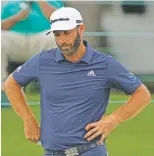  ?? GREGORY BULL/ASSOCIATED PRESS ?? Defending Masters champion Dustin Johnson is out Friday after missing the cut.