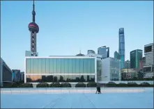  ?? Odyssey and Homecoming PHOTOS PROVIDED TO CHINA DAILY ?? Top: Visitors to Cai Guoqiang’s exhibition at the Museum of Art Pudong in Shanghai.
Above: Designed by French architect firm Ateliers Jean Nouvel, the museum is another Shanghai landmark.