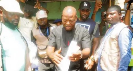  ?? Photo: NAN ?? APC governorsh­ip candidate in Anambra State, Tony Nwoye, casts his vote at Ward 1 Unit 8 in Nusgbe, Anambra East Local Government Area, during the Anambra Governorsh­ip Election yesterday