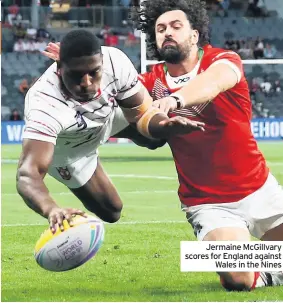  ??  ?? Jermaine McGillvary scores for England against
Wales in the Nines