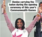  ?? ?? Denise carrying the baton during the opening ceremony of this year’s Commonweal­th Games