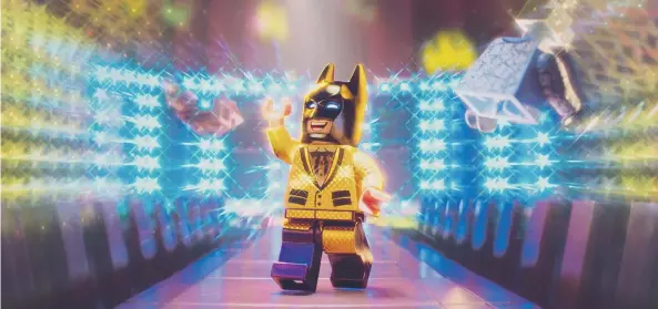  ??  ?? The Caped Crusader is the star of the show in this Lego Movie followup.