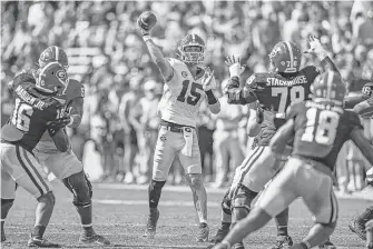  ?? DALE ZANINE/USA TODAY SPORTS ?? Georgia quarterbac­k Carson Beck passes during the team’s spring game. He has attempted 12 passes over the past two seasons.