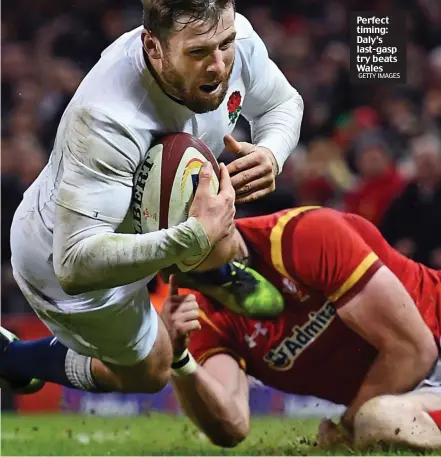  ?? GETTY IMAGES ?? Perfect timing: Daly’s last-gasp try beats Wales