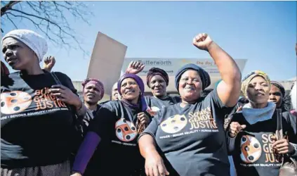  ??  ?? Community Action Team demanding justice for the domestic violence murder of Sandiswa Mhaluwi at the Butterwort­h Magistrate Court, September 2014