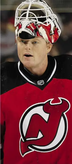  ?? BRUCE BENNETT / GETTY IMAGES ?? Cory Schneider, bottom, took the Vancouver Canucks’ No. 1 goaltender job last season before a shocking trade at the 2013 NHL entry draft sent him to the New Jersey Devils.