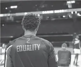  ?? MARYLAND ATHLETICS ?? Before games, Maryland men’s basketball players wear warmup suits with words such as “Equality” and “Respect” emblazoned on the back.