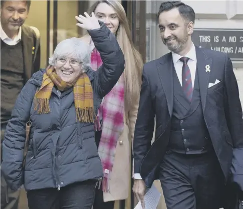  ??  ?? 0 Clara Ponsati - with her lawyer Aamer Anwar - leaves St Leonard’s Police Station in Edinburgh after being released on bail