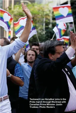  ?? Photo: Reuters ?? Taoiseach Leo Varadkar joins in the Pride march through Montreal with Canadian Prime Minister Justin Trudeau.