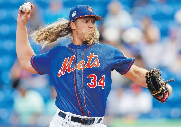  ?? — THE ASSOCIATED PRESS FILES ?? Noah Syndergaar­d delivers a pitch in a spring training baseball game against the Houston Astros on March 3 in Port St. Lucie, Fla.