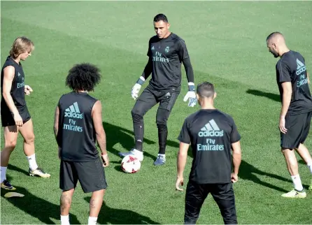  ??  ?? Real Madrid players at a training session in Madrid on Tuesday, the eve of their Spanish Super Cup second leg match against Barcelona.