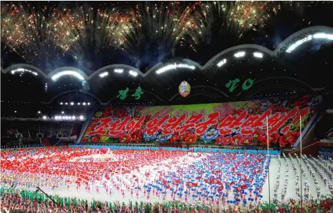  ??  ?? Fireworks explode during the Mass Games at the May Day stadium marking the 70th anniversar­y of North Korea’s foundation in Pyongyang. — Reuters photo