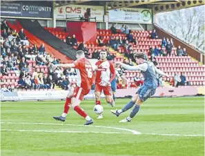  ?? ?? Rob Harker fires at goal. Pic: Chris Nutton/FC Halifax Town