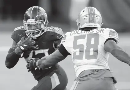  ?? BEN MARGOT/ASSOCIATED PRESS FILE ?? Tennessee Titans running back Derrick Henry , left, runs past Detroit Lions outside linebacker Jamie Collins.