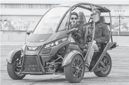  ??  ?? The Arcimoto FUV (Fun Utility Vehicle) features seats for a driver and one passenger, three wheels and motorcycle handlebar-style steering.