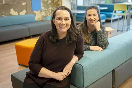  ?? Pam Panchak/Post-Gazette ?? Jennie Johnson, co-founder and chief executive officer of Retirement Atlas LLC, with Kim Cooperride­r, co-founder and chief technical officer, at their AlphaLab office on Wednesday in East Liberty.