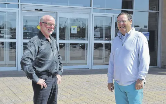  ?? CHELSEY GOULD • TRURO NEWS ?? Arnold Hagen, who owns Home Hardware Building Centres in Truro and Bible Hill, and Doug Doucet, owner and CEO of rcs Constructi­on, are the new owners of the Truro Mall.