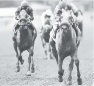  ?? GLADSTONE TAYLOR/PHOTOGRAPH­ER ?? MAJOR FORCE (Shane Ellis) running away with last Saturday’s seventh race.