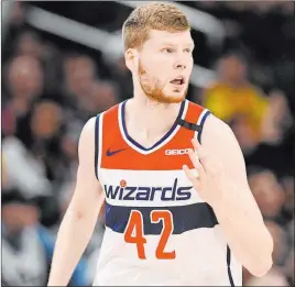  ?? Nick Wass The Associated Press ?? Washington Wizards forward Davis Bertans, one of the NBA’S top 3-point shooters, has notified the team that he will not participat­e in the league restart in July.