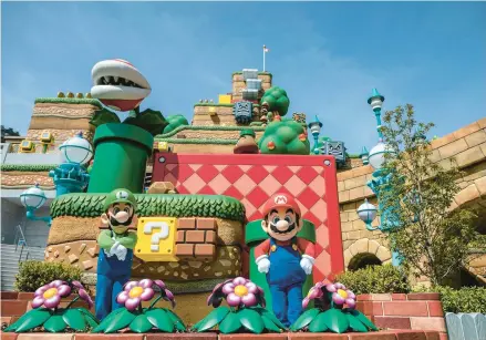  ?? PHILIP FONG/GETTY-AFP 2021 ?? A Super Nintendo World already exists in Japan, above. Super Nintendo World at Universal Studios Hollywood will open Feb. 17.