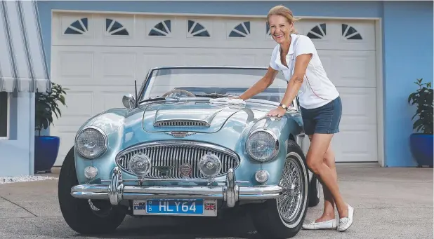  ??  ?? DRIVING PASSION: Car enthusiast Lyn Morgan will be participat­ing in the rally in her 1964 Austin Healey convertibl­e Picture: BRENDAN RADKE