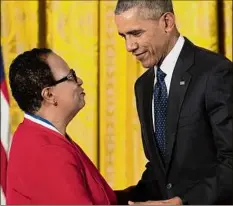  ?? Drew Angerer / Getty Images ?? Shirley Ann Jackson shakes hands with President Barack Obama on May 19, 2016, after receiving the National Medal of Science, during a ceremony at the White House.