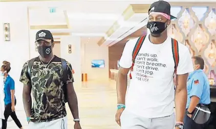  ?? MIAMI HEAT COURTESY ?? The Heat’s Kendrick Nunn, left, and Bam Adebayo have made their Disney entrances in preparatio­n for the NBA’s summer return.