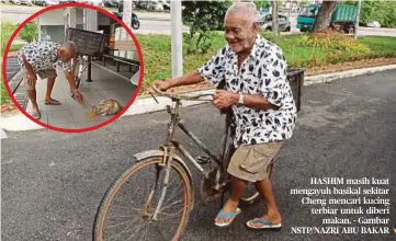  ?? ?? HASHIM masih kuat mengayuh basikal sekitar Cheng mencari kucing terbiar untuk diberi makan. - Gambar NSTP/NAZRI ABU BAKAR