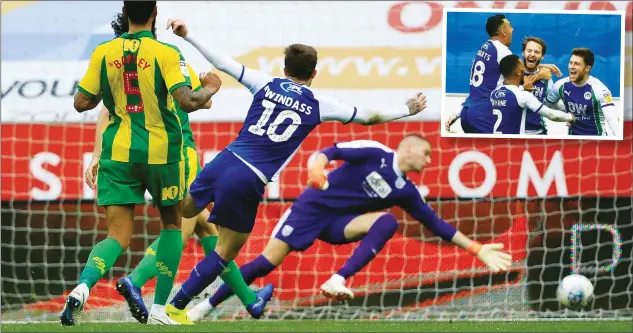  ?? PICTURE: PA Images ?? INTO THE CORNER: Josh Windass scores Wigan’s winner and, inset, celebrates with his team-mates
