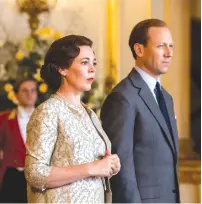  ?? (Sophie Mutevelian/Netflix/TNS) ?? OLIVIA COLMAN as Queen Elizabeth II and Tobias Menzies as Prince Philip appear in ‘The Crown.’