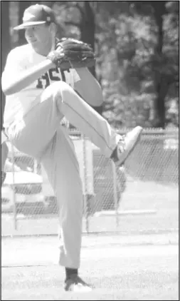  ?? Photo by Gerren Smith ?? READY FOR WORLD SERIES ACTION: Hot Spring County All-Stars 17U pitcher Hunter Rook of the Ouachita Warriors eyes the strike zone from the mound during summer baseball competitio­n.