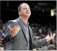  ?? NWA Democrat-Gazette/J.T. WAMPLER ?? Oral Roberts Coach Paul Mills spent 14 years as an assistant at Baylor, helping build the Bears into a national power, so he knows a good team when he sees one. He said he saw one Tuesday night in the Arkansas Razorbacks. “Me having been at the Big 12...