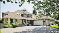 ??  ?? This large gated, executive home in Surrey offers a retreat- like setting.