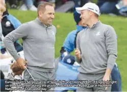  ?? – REUTERSPIX ?? Europe team’s Sergio Garcia of Spain (left) and Danny Willett of England (right) on the 16th green during the practice round for the Ryder Cup at Hazeltine National Golf Club yesterday.