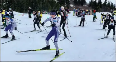  ?? ?? MASS START — White Mountain seventh-grader Lana Ashenfelte­r, center, gets a good start during the 4.8kilometer junior high ski race at the 44th Annual BSSD Ski and Biathlon Championsh­ips on Thursday in Unalakleet. Ashenfelte­r went on to earn a bronze medal in the junior high girls division.