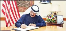  ?? Photo by Bassam Abu Shanab ?? A citizen signs on the condolence book.