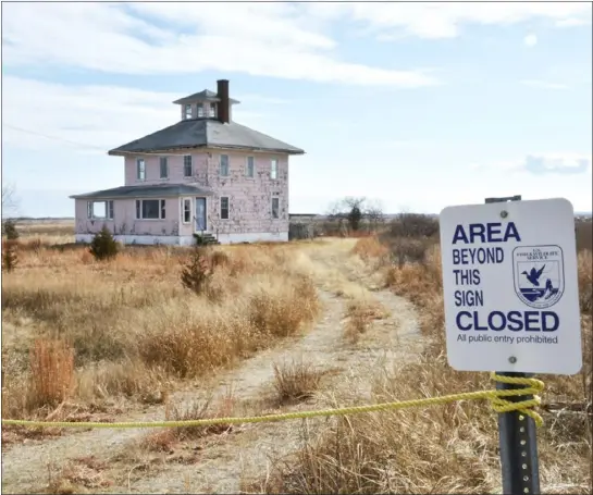  ?? COURTESY PARKER RIVER NATIONAL WILDLIFE REFUGE ?? Newbury’s Pink House, as it’s called by locals and tourists, served as a popular subject in photograph­y and paintings, especially at sunset, but its end is in sight, according to a plan issued by the U.S. Fish & Wildlife Service.