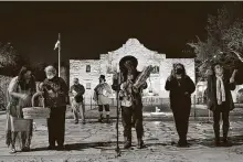  ?? Robin Jerstad / Contributo­r ?? Ricky Reyes leads a Native American blessing in front of the Alamo. Indigenous stories are part of the addition some supporters would like to be added to the plaza reimaginin­g.