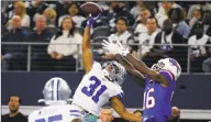  ?? Michael Ainsworth / Associated Press ?? Former St. Paul and UConn star Byron Jones, seen breaking up a pass in a 2019 game against Buffalo, became the highest-paid cornerback in NFL history.