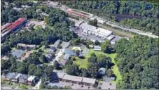  ?? SCREENSHOT FROM GOOGLE EARTH ?? UniTech’s Royersford facility, the white building against the railroad tracks, is located at 401 N. Third Ave.