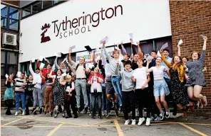  ?? ?? ●●Celebratin­g A Level students at Tytheringt­on School