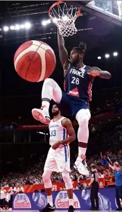  ?? (Photo AFP) ?? Mathias Lessort a régalé le bouillant public chinois : les Bleus ont fait le plein de confiance avant d’affronter la Lituanie demain (14h, sur Canal + Sport).