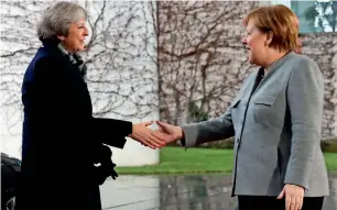  ?? Reuters ?? Angela Merkel greets theresa May at the Chanceller­y in Berlin on tuesday. —