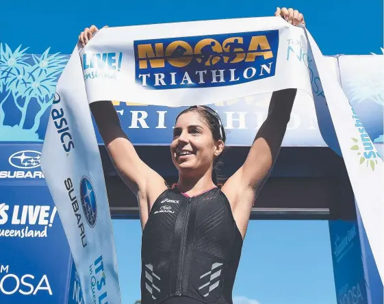  ?? Picture: GETTY IMAGES ?? Ashleigh Gentle celebrates after claiming her four Noosa Triathlon last year.