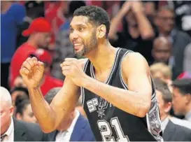  ?? STEPHEN DUNN/ GETTY IMAGES ?? Tim Duncan was drafted No. 1 overall in 1997 by a struggling San Antonio franchise. Two years later, the Spurs were the NBA champions — the first of five titles with Duncan.