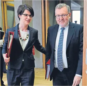  ?? Picture: Andrew Cowan. ?? Scottish Secretary David Mundell and Chloe Smith, Minister for the Constituti­on, arrive at Holyrood.